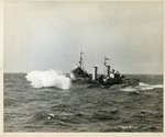 HMS Edinburgh underway in the Atlantic Ocean while escorting USS Wasp, 3 Apr 1942; side 1 of photo