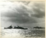 HMS Edinburgh and the cruiser USS Tuscaloosa underway in the Atlantic Ocean while escorting USS Wasp, 3 Apr 1942; side 1 of photo