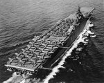 24 SBD, 11 F6F, and 18 TBF/TBM aircraft parked on the flight deck of carrier Essex, May 1943
