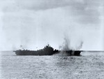 USS Essex under Japanese attack, off Japan, 19 Mar 1945