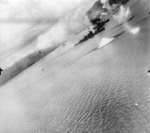 USAAF 3rd Bomb Group aircraft attacking Haguro and other ships in Simpson Harbor, Rabaul, New Britain, 2 Nov 1943, photo 1 of 2