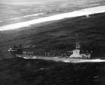 USS Harder rescuing aviator Ensign John Galvin off Woleai, Caroline Islands, 1 Apr 1944; note SOC Seagull seaplane in background