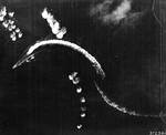 Hiryu maneuvering to avoid three sticks of bombs dropped by B-17 bombers, off Midway Atoll, shortly after 0800 hours, 4 Jun 1942, photo 1 of 2
