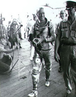 Astronaut Scott Carpenter aboard Intrepid after his capsule was recovered by the carrier, 24 May 1962