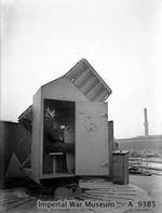 Close-up of a rocket launcher control cabin aboard HMS King George V while she was in drydock at Rosyth, Scotland, United Kingdom, circa 1940-1941