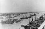 French cruiser La Motte-Picquet (only stern visible), USS Chaumont, and Italian cruiser Bartolomeo Colleoni at Shanghai, China, late May or early Jun 1939