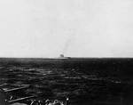 Lexington underway as seen from Yorktown, whose flight deck edge and aircraft can be seen at bottom of photo, Battle of Coral Sea, 8 May 1942
