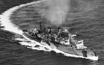 HMS Mauritius making a tight turn, circa 1940s