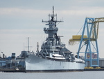 Battleship New Jersey in Camden, New Jersey, United States as seen from Philadelphia, Pennsylvania, United States across the Delaware River, 22 Oct 2011, photo 1 of 2