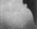 Nisshin (center) and an unidentified Japanese ship (bottom) at Tonolei Harbor, Bougainville, 13 Oct 1942