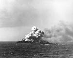 Light cruiser Reno approached the burning light carrier Princeton, off the Philippine Islands, at 1004 on 24 Oct 1944; photographed from battleship South Dakota