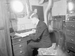 Chaplain Whitestone of the Roman Catholic faith aboard HMS Rodney, 1940