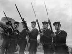 Sailors conducting bayonet drill aboard HMS Rodney, Firth of Forth, Scotland, United Kingdom, 1940