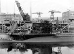 Portside amidships of USS S-28 at Puget Sound Navy Yard, Bremerton, Washington, United States during inclining experiment, 11 Jun 1943