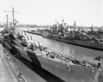 USS San Diego at Mare Island Naval Shipyard, Vallejo, California, United States, 9 Apr 1944, photo 1 of 2; note camouflage Measure 33, Design 24d; USS Cassin and USS Denver in background