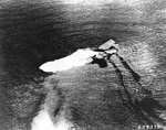 Saratoga sinking after atomic bomb blast, Bikini Atoll, Marshall islands, 25 Jul 1946, photo 1 of 2