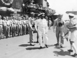 British Royal Navy Rear Admiral Clement Moody visiting US carrier USS Saratoga, 27 Mar 1944