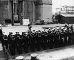 Crew of USS Segundo hearing an address during her change of command at Mare Island Naval Shipyard, California, United States, 18 Oct 1955