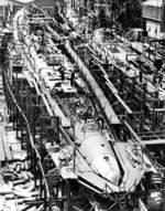 Tang (left) and Tilefish (right) under construction at Mare Island Navy Yard, Vallejo, California, United States, 1 Jul 1943, photo 2 of 3