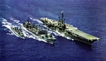 USS Kawishiwi refueling destroyer USS Rogers and carrier USS Ticonderoga in the Western Pacific, 1960