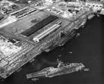 USS Ticonderoga, USS Kitty Hawk, and USS Constellation at Naval Air Station North Island, San Diego, California, United States, circa mid-1970