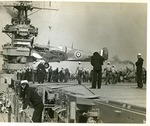 Spitfire Mk. Vc-Tropical variant from No. 603 Squadron RAF being hauled aboard USS Wasp (Wasp-class) by a crane, Glasgow, Scotland, United Kingdom, 13 Apr 1942, photo 3 of 3