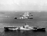 USS Wasp, USS Yorktown, USS Hornet, USS Hancock, USS Ticonderoga, and other warships at Ulithi Atoll, Caroline Islands, 8 Dec 1944, photo 2 of 3