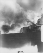 View aboard USS Wasp during 5-inch/38 caliber gun firing practice, 24 Dec 1944