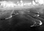 USS Wasp (lower right) and other Essex-class carriers, escorted by battleships, cruisers, and destroyers of Task Force 38 maneuvering off Japan, 17 Aug 1945