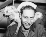 Murray Dreyus with the mascot dog of USS Whale, 1945