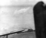 Yorktown under attack by dive bombers, seen from cruiser Portland, 4 Jun 1942