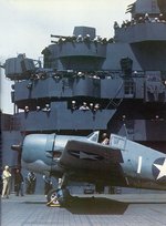 F6F-3 Hellcat fighter being prepared for launch aboard USS Yorktown during the carrier