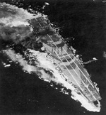 Carrier Zuiho damaged during Battle off Cape Engaño, 25 Oct 1944; note battleship camouflage; as seen on page 68 of US Navy War Photographs