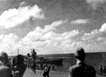 Vice Admiral Jisaburo Ozawa transferring his flag from damaged carrier Zuikaku to light cruiser Oyodo, at 1100 hours on 25 Oct 1944