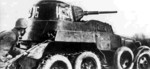 Soviet BA-10 armored car in action, date unknown; note tracked rear wheels