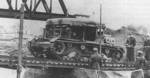 C7P artillery towing vehicle crossing a bridge, date unknown