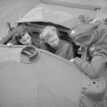 A sergeant from the British Fife and Forfar Yeomanry showing two female factory workers the turret of a Covenanter tank, Wellingborough, Northamptonshire, England, United Kingdom, 26 Oct 1941