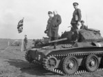 Prime Minister Winston Churchill and Major-General Brian Horrocks inspecting British 9th Armoured Division atop a Covenanter tank of 4th/7th Royal Dragoon Guards, new Newmarket, Suffolk, England, United Kingdom, 16 May 1942