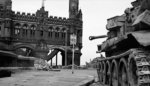 A Cromwell tank guarding a bridge over the Elbe River, Hamburg, Germany, 3 May 1945