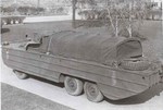 Rear quarter view of an earlier DUKW variant (straight windshield; left-mounted spare tire), date unknown