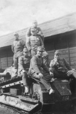 Japanese troops on top of a FT light tank, date unknown