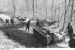 German Panzerkampfwagen 39H 735(f) tank being used to remove trees in a Balkan forest, 1941-1942 photo 2 of 2