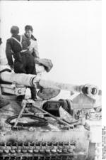 Two German soldiers on a Hornisse/Nashorn tank destroyer, Russia, Mar 1944