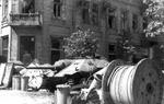 Polish barricade at Napoleon Square, Warsaw, Poland, 3 Aug 1944, photo 1 of 4; note captured Jagdpanzer 38(t) tank destroyer as part of barricade