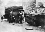 Destroyed Jagdpanzer 38(t) on the street of Warsaw, Poland, 5 Aug 1944; this vehicle was captured by Polish fighters and destroyed by Germans during fighting near the main post office