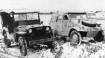 Willys MB Slat-Grille Jeep parked beside a Type 82 Kübelwagen, probably on the Eastern Front, date unknown