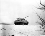 M36 Jackson tank destroyer, camouflaged in white, operating near Dudelange, Luxembourg, 3 Jan 1945