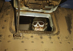 M3 medium tank driver looking through the forward port hole, Fort Knox, Kentucky, United States, Jun 1942
