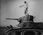 US Marine Corps signalman atop a M3 Stuart light tank during an exercise in the United States, 1942