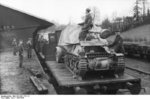 Unloading a Marder I tank destroyer from a train car, Belgium or France, 1943-1944, photo 01 of 10
